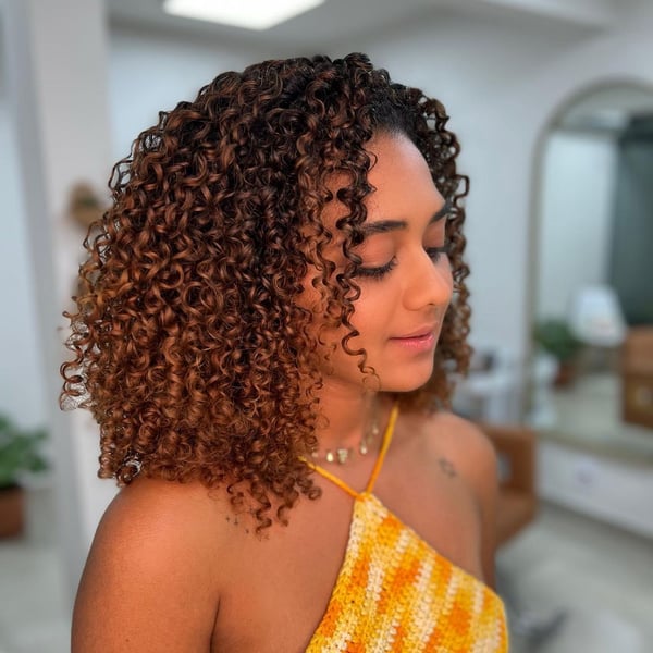 50 Essential Mid-Length Curly Hairstyles for 2024