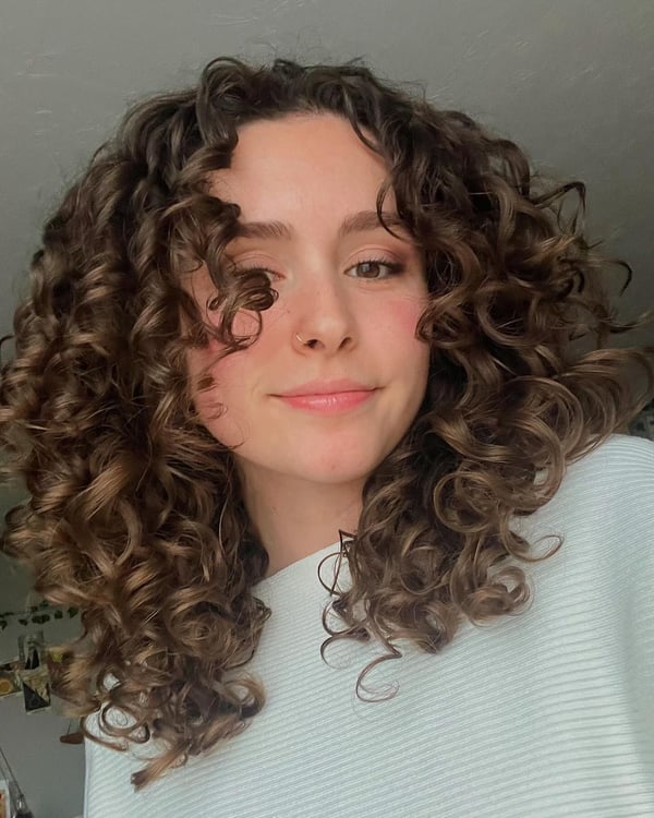 Top 50 Trendy, Mid-Length Curly Cuts for 2024