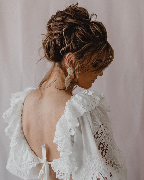 Elegant Twisted Updo with Lace Details